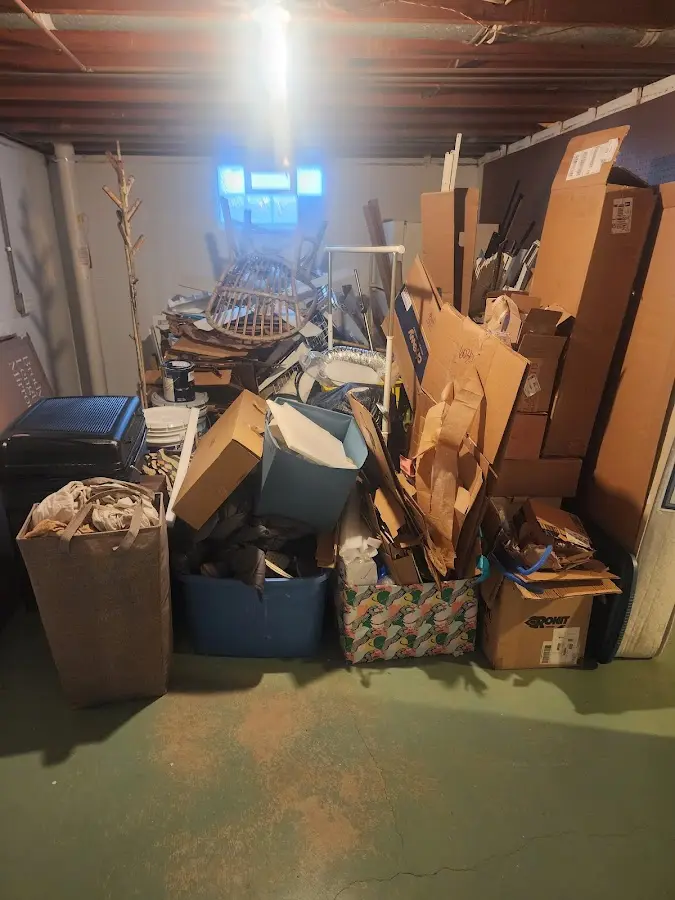 Roll-off dumpster container at job site for 4 Yard Dumpster Rental in Plaistow